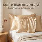 Champagne satin pillowcases, set of 2, on a bed in morning light