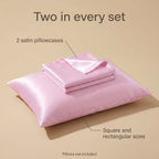 Pink satin pillowcase set of 2: one on a pillow, one folded