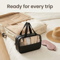 Black makeup bag packed for travel